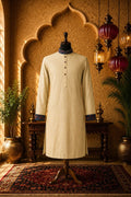 Cream contrast kurta with button placket and blue trim on cuffs and hem