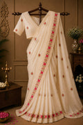 Ivory saree with red floral embroidered border and sheer pallu