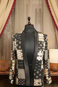 Patchwork statement jacket with black and white abstract mono pattern