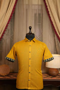 Mustard Muse shirt, mustard yellow short-sleeve button-up with patterned cuffs