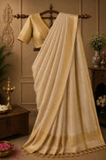 Gold sari with woven border and tassel trim