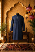 Royal blue kurta with long sleeves, round neck, and front button placket